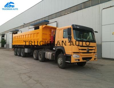 China Heavy Duty Semi Trailer Bottom Dump Truck 50 Tons With Hydraulic Lifting for sale