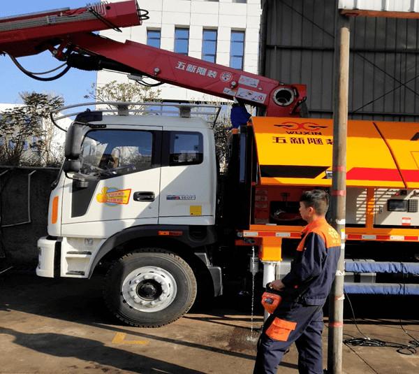 The Wireless Remote Controller from Cyber-MI Applied to the Wet Spraying Machine in the Wuxin Tunnel Project