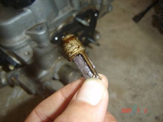 Troubleshooting: Engine Malfunction Indicator Lamp Caused by Oil Passage Blockage in Toyota Camry
