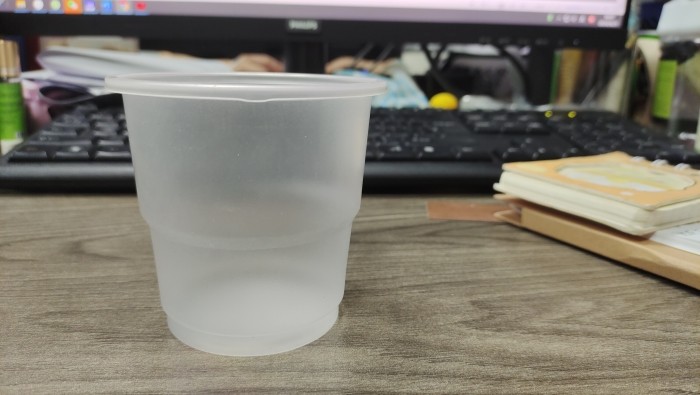 Disposable plastic water cups are produced using the 750 thermoforming machine